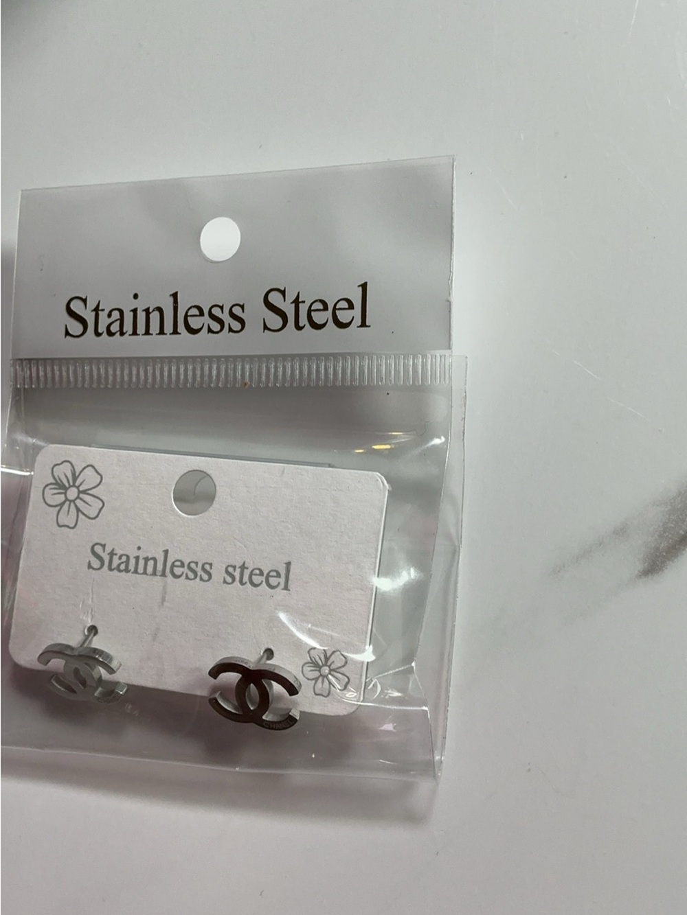 Stainless Steel Interlock Logo Stud Earrings - Silver